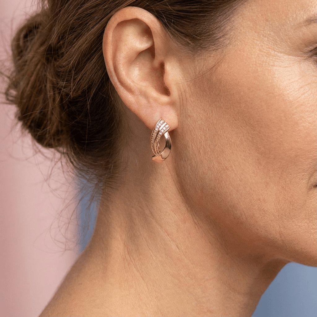 Elegant earrings with zirconia in rose gold