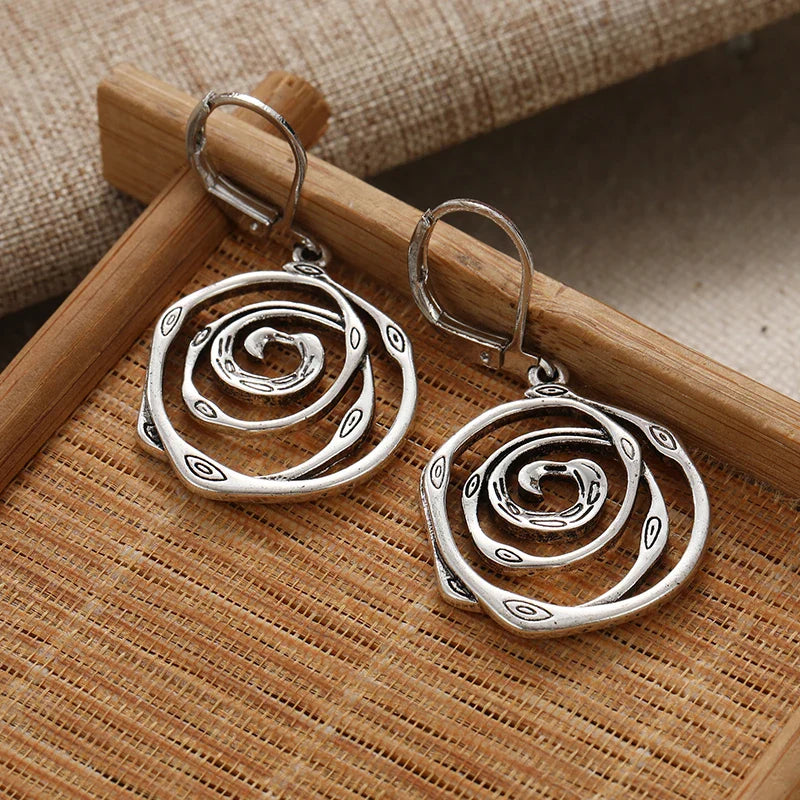 Sculptural Spiral Sterling Silver Drop Earrings