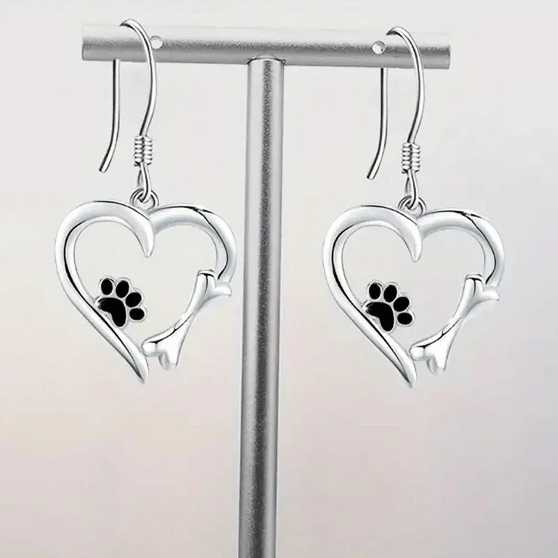 Silver pendant earrings with heart and paw design