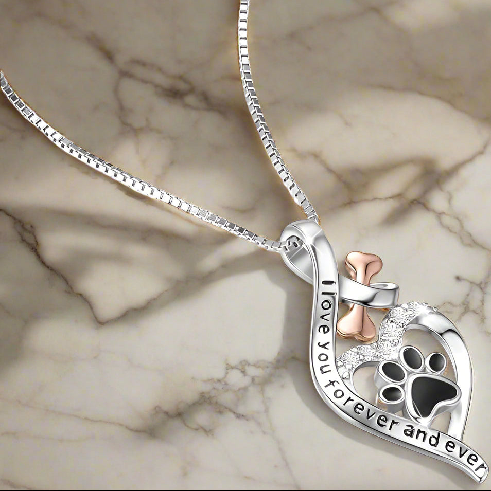 Lucky Paw necklace with heart, bone and infinity symbol