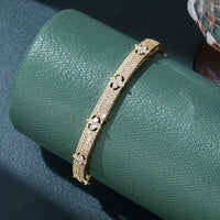Elegant Floral Design Zirconia Inlaid Gold Plated Bracelet