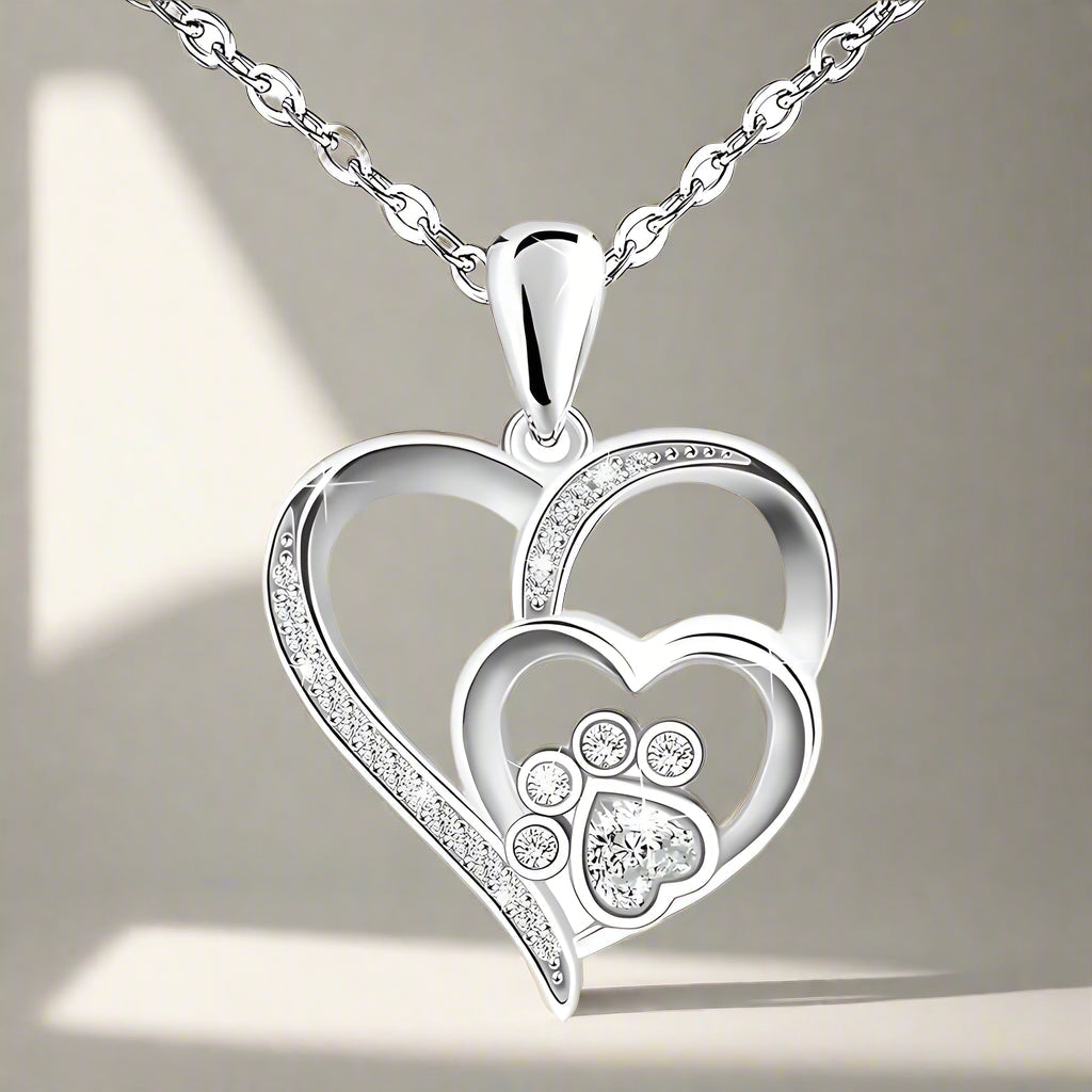 Sterling silver necklace with paw and heart with cubic zirconia